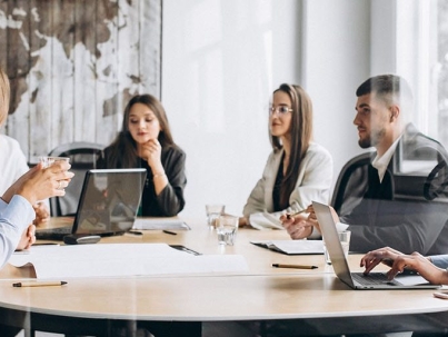 Group of people working out business plan in an office
